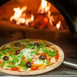 Pizzaschaufel Aus Aluminium - Ø 30 Cm -Küchen Verkauf stockkkbild 3482